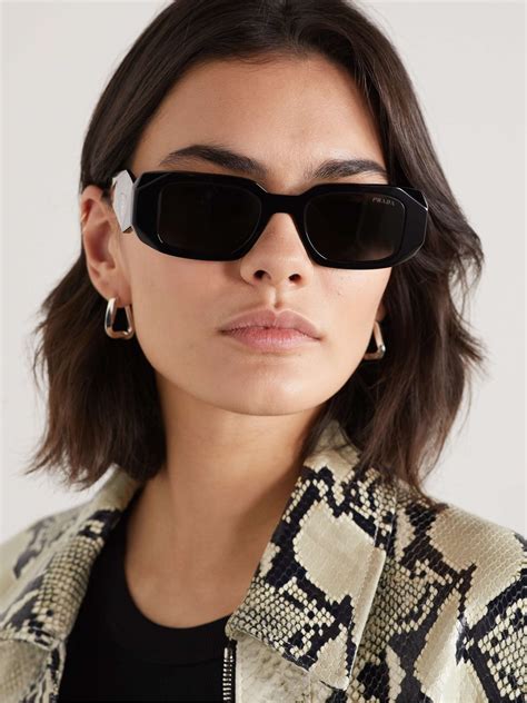 prada shaped sunglasses|prada sunglasses models.